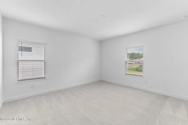 a bathroom with a tub shower sink vanity granite and a shower