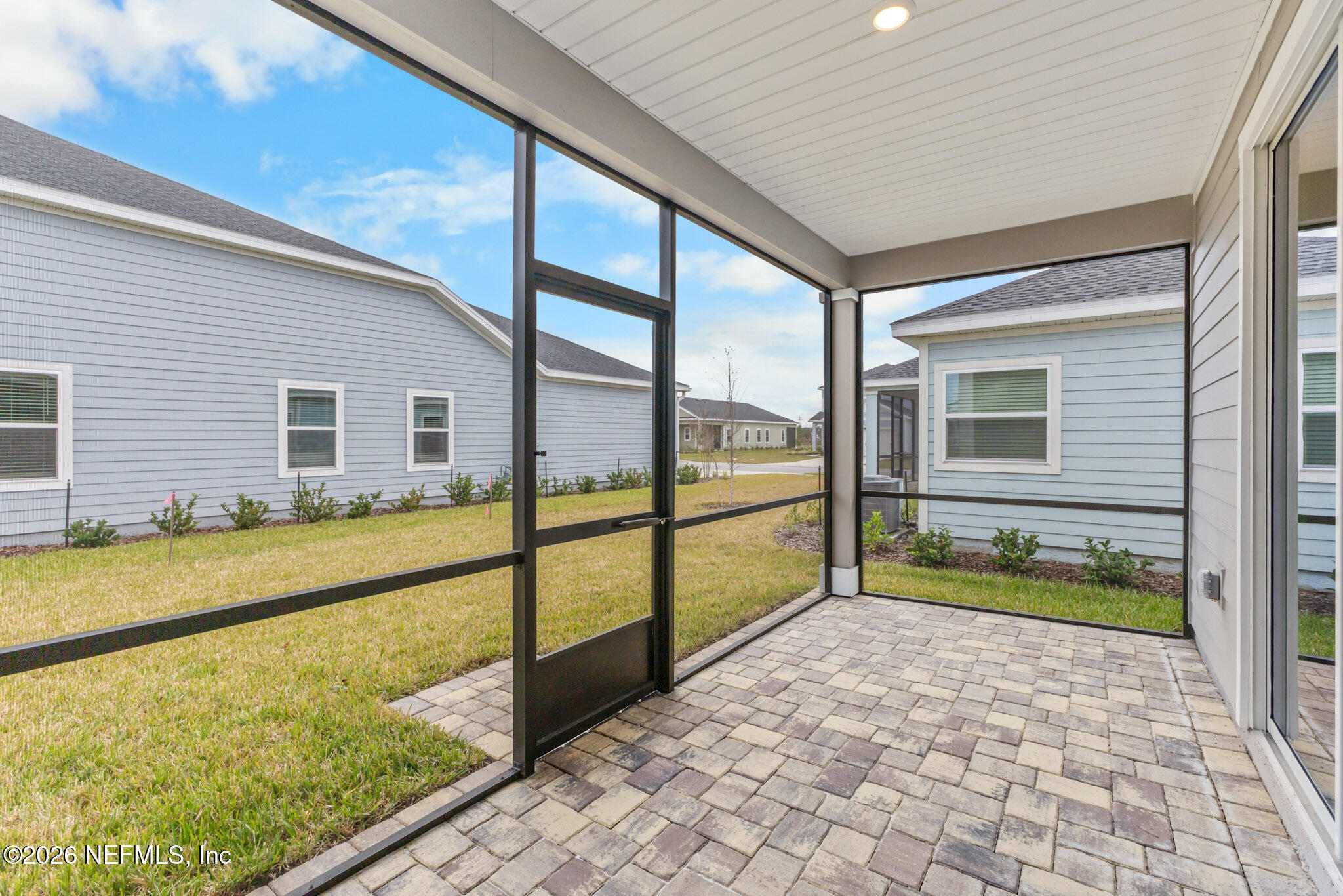 299 Pentwater Road St. Augustine, FL 32092 - Photo 23 of 25 a view of swimming pool with chairs in front of house