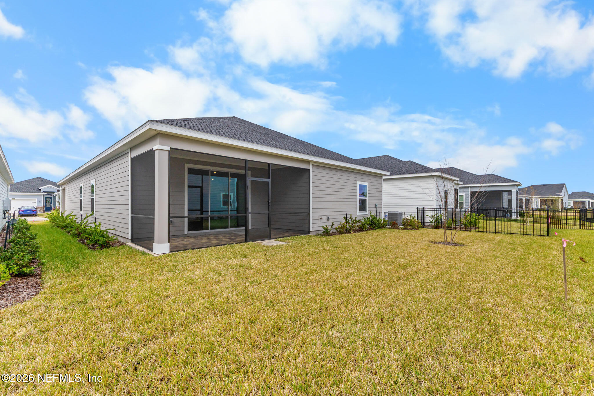 299 Pentwater Road St. Augustine, FL 32092 - Photo 24 of 25 a front view of a house with yard and balcony