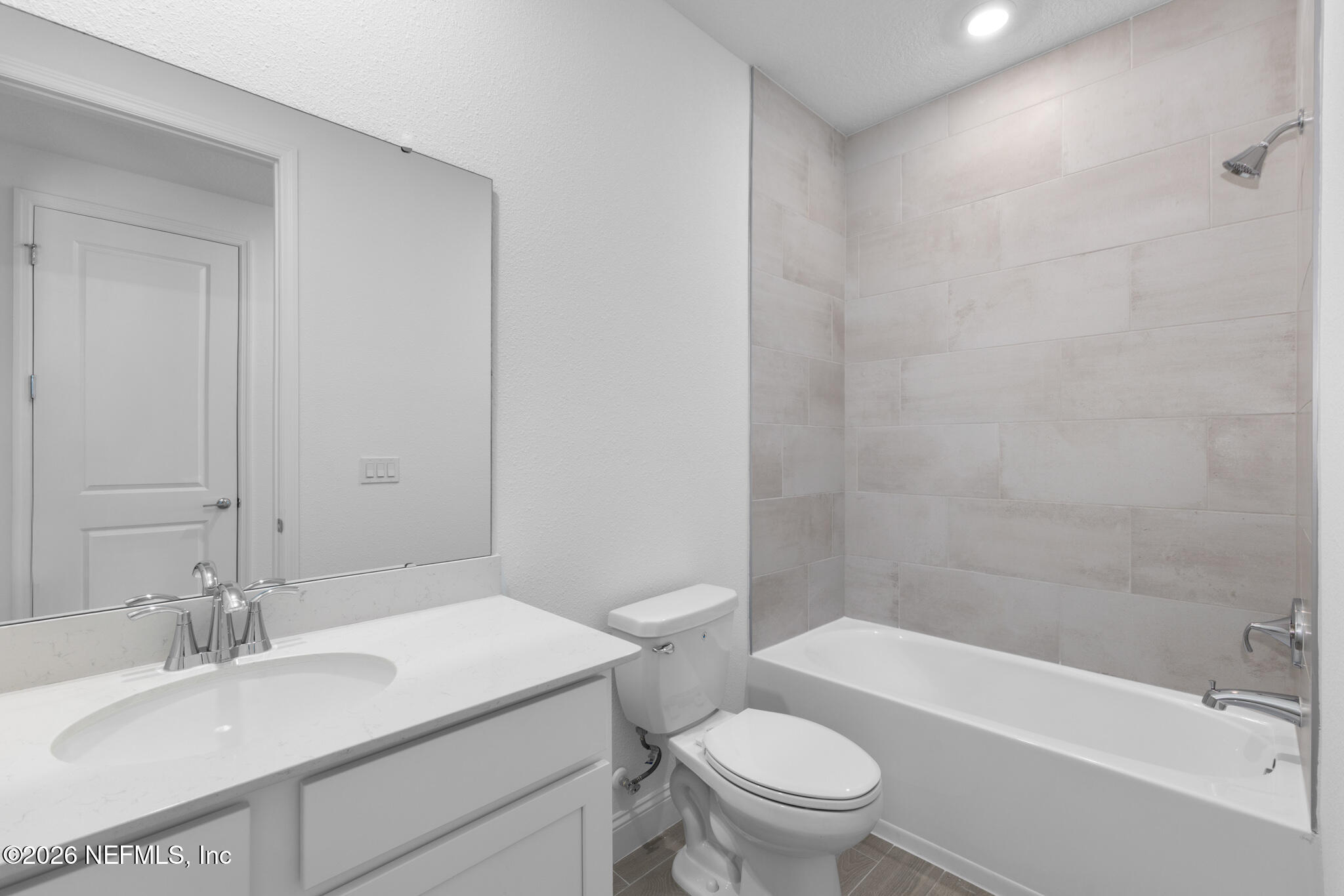 299 Pentwater Road St. Augustine, FL 32092 - Photo 6 of 25 a bathroom with a sink a toilet and bathtub