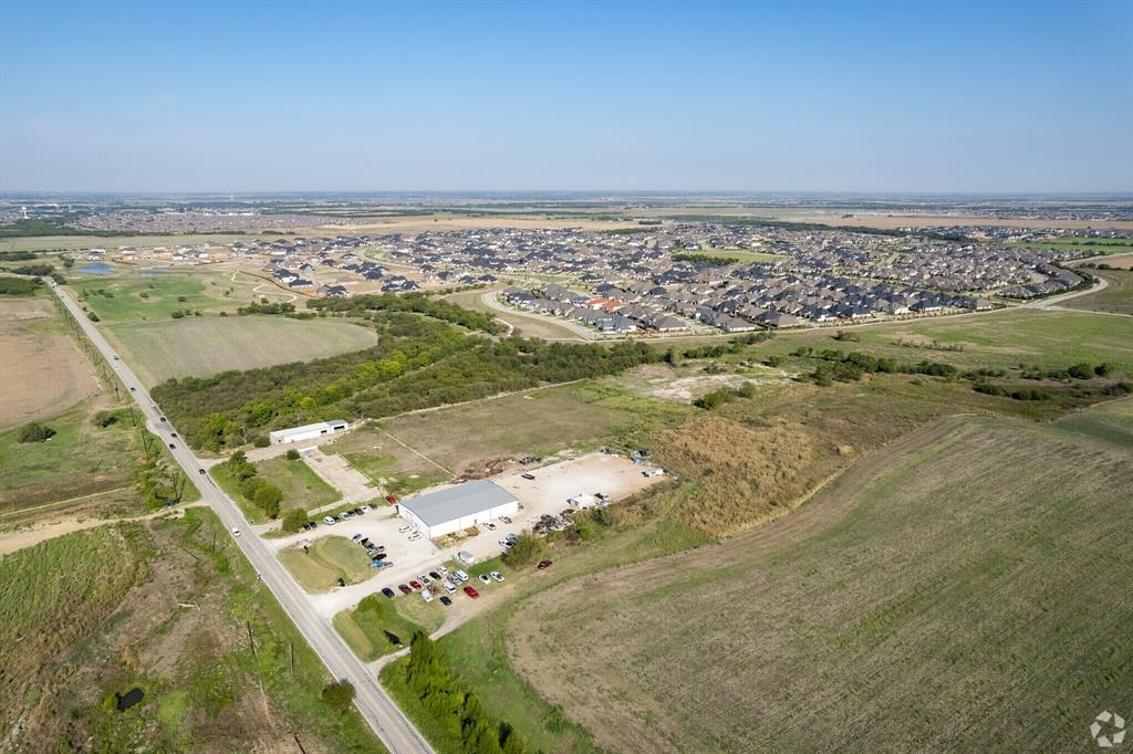 1488 West First Street Prosper, TX 75078 - Photo 2 of 8 a view of a city