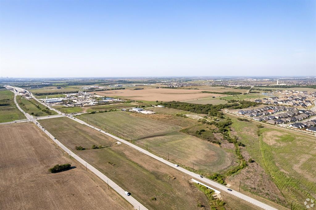 1488 West First Street Prosper, TX 75078 - Photo 6 of 8 a view of an ocean and beach