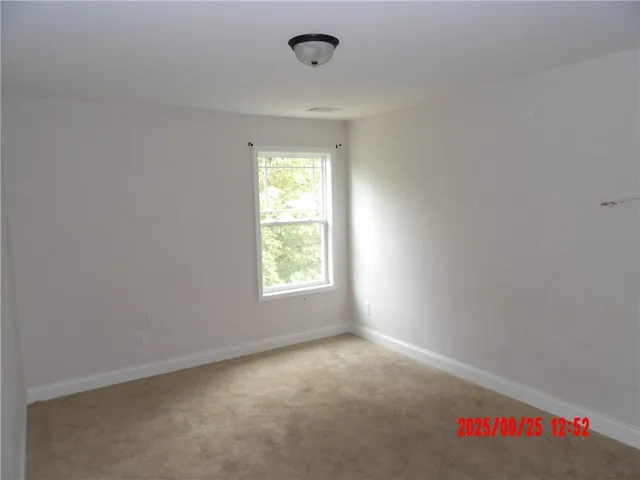 an empty room with a window