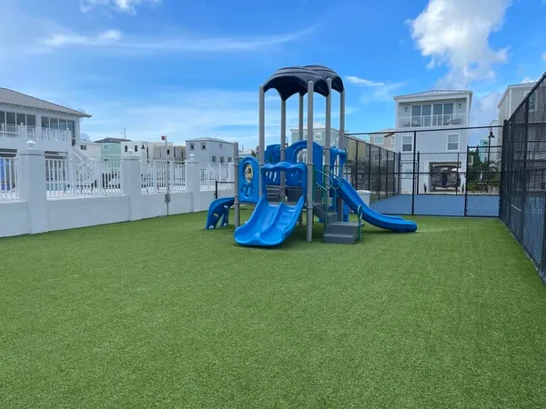 a view of a balcony with wooden floor