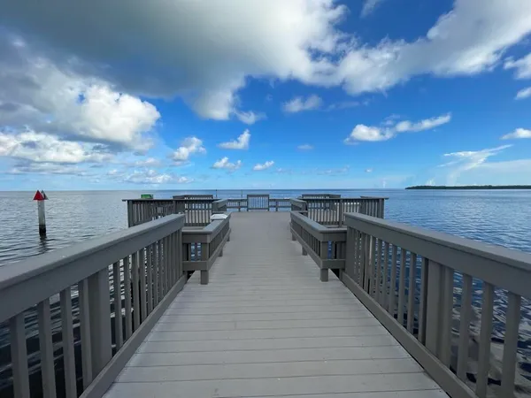 a view of a lake with a deck