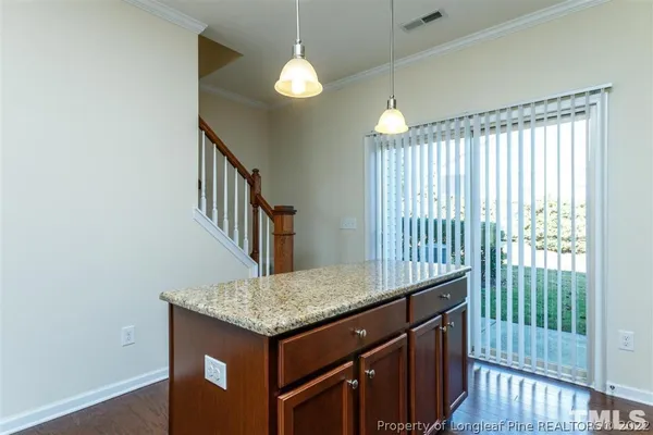 a view of entryway with hardwood floor