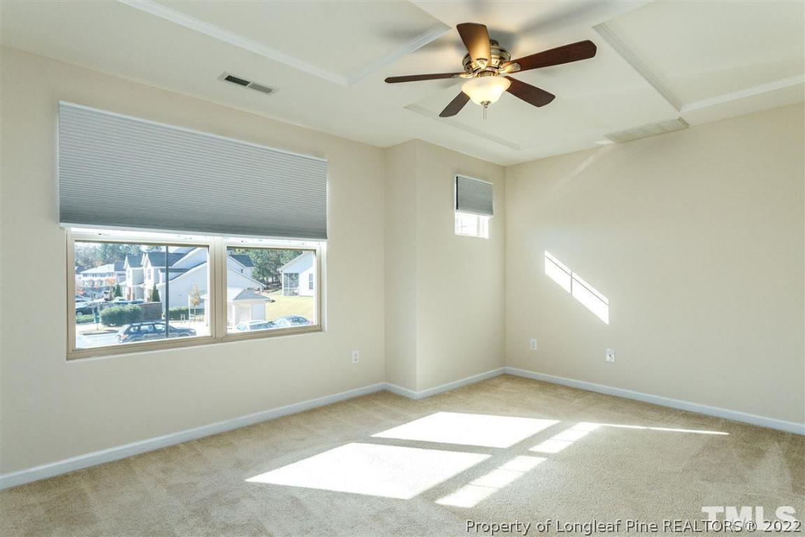 110 Mt Evans Drive Durham, NC 27705 - Photo 14 of 27 a view of an empty room with a window