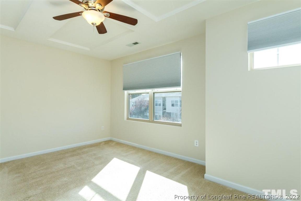 110 Mt Evans Drive Durham, NC 27705 - Photo 15 of 27 a view of an empty room with a window