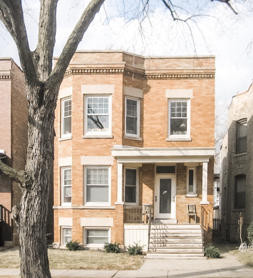 1330 West Roscoe Street, Unit 2 Chicago, IL 60657 - Photo 1 of 11 a front view of a building