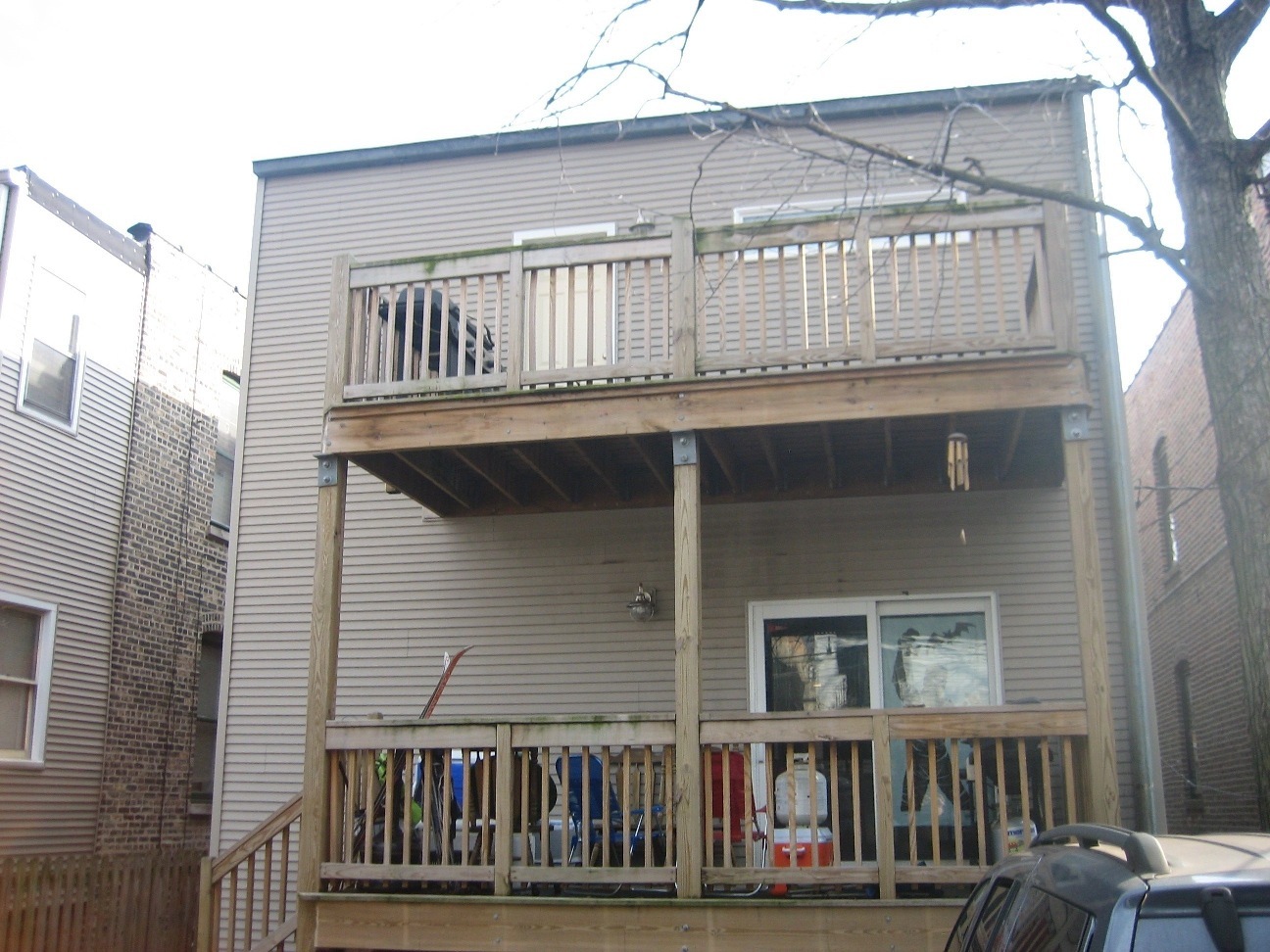 1330 West Roscoe Street, Unit 2 Chicago, IL 60657 - Photo 11 of 11 a front view of a house with balcony
