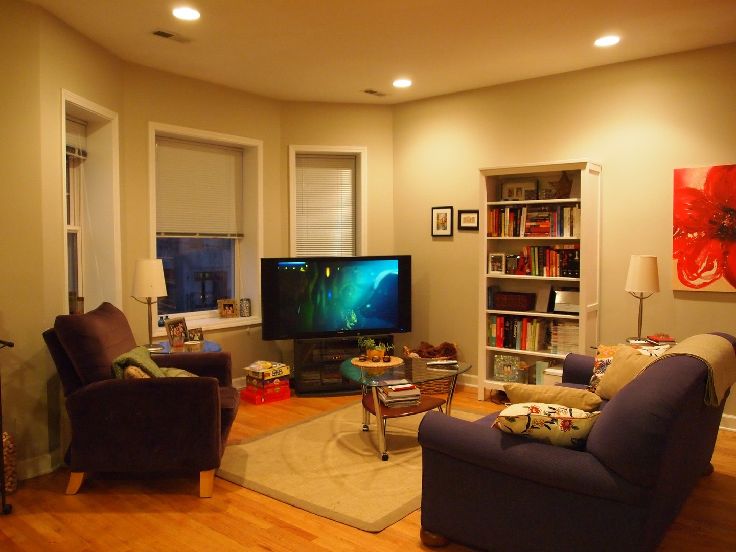 1330 West Roscoe Street, Unit 2 Chicago, IL 60657 - Photo 3 of 11 a living room with furniture and a flat screen tv