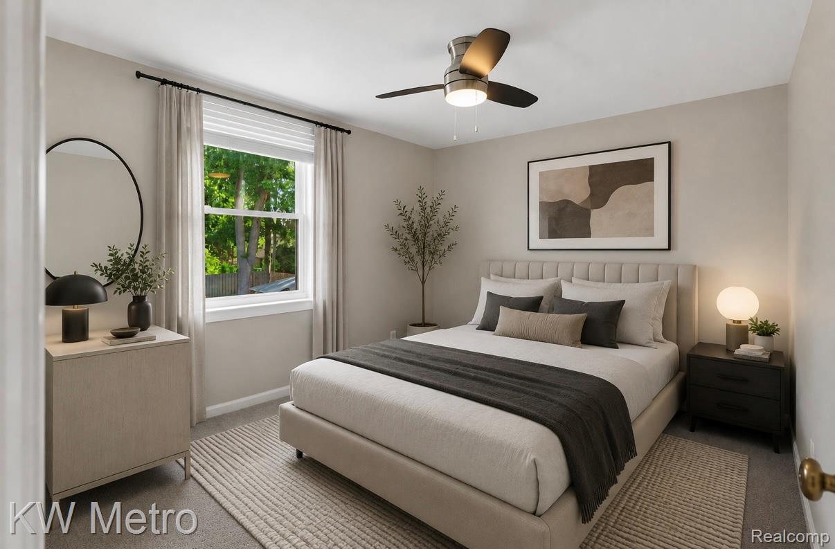 1458 Hampton Road Grosse Pointe, MI 48236 - Photo 26 of 43 Carpeted bedroom featuring a double-paned window, neutral wall tones, a ceiling fan with integrated lighting, and a paneled headboard
