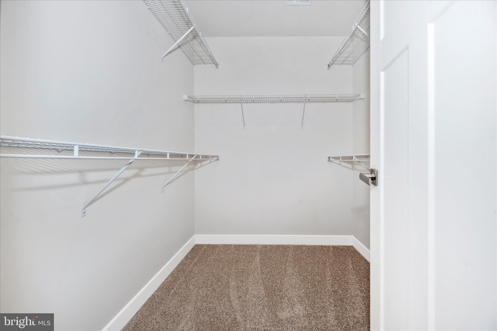 7091 Kokanee Way New Market, MD 21774 - Photo 26 of 69 a view of a room with racks on the wall