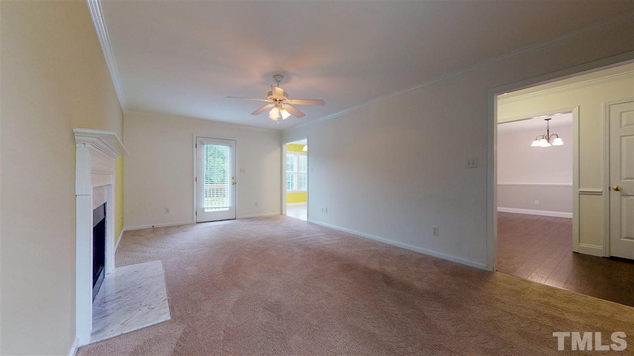 4840 Topstone Road Raleigh, NC 27603 - Photo 12 of 30 wooden floor in an empty room with a window