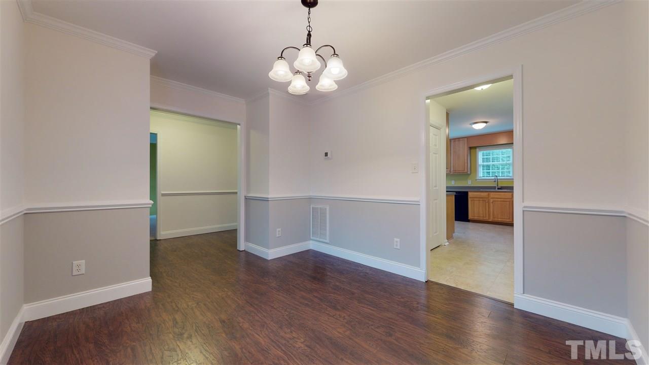 4840 Topstone Road Raleigh, NC 27603 - Photo 14 of 30 a view of a room with wooden floor