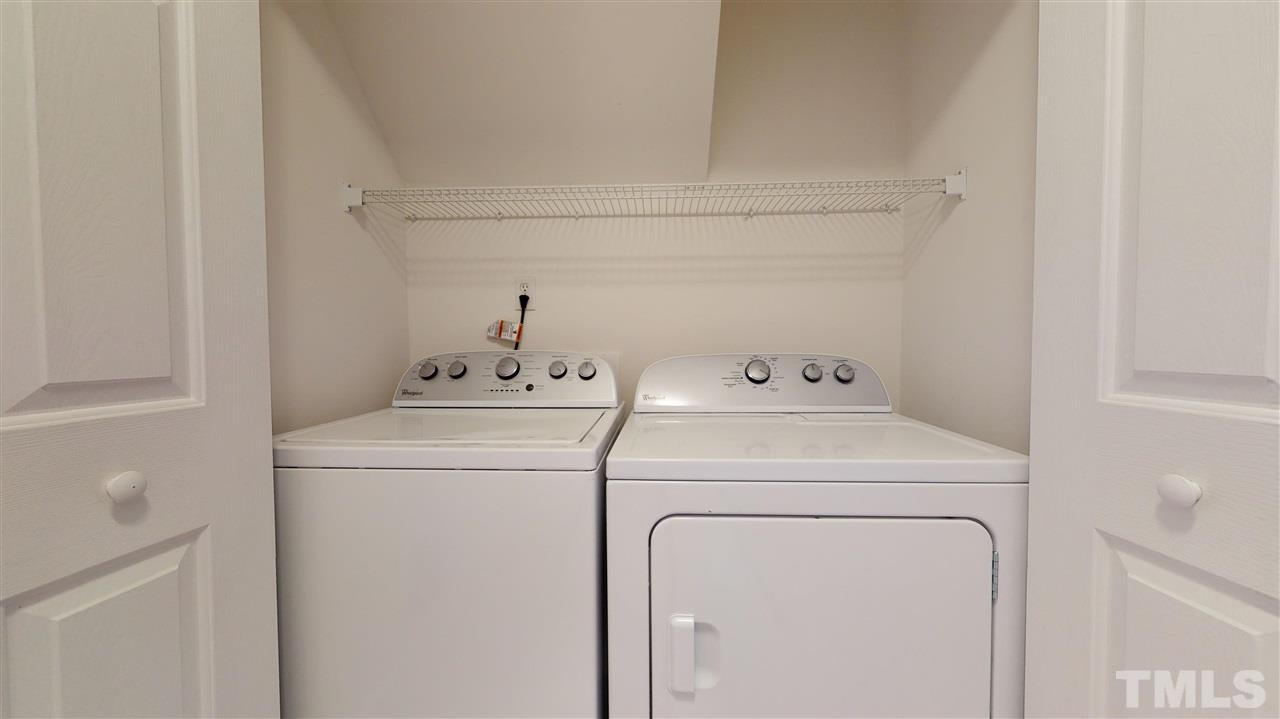 4840 Topstone Road Raleigh, NC 27603 - Photo 30 of 30 a utility room with dryer and washer