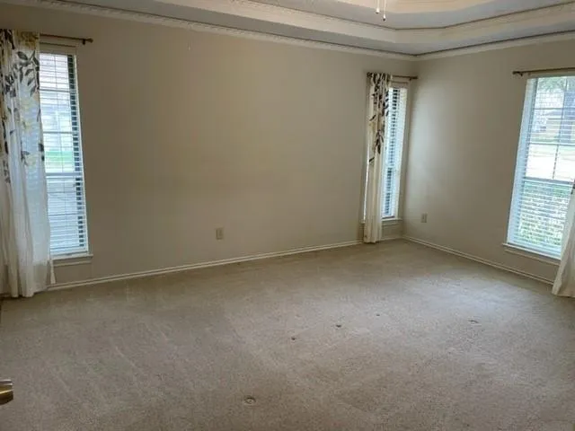 an empty room with windows