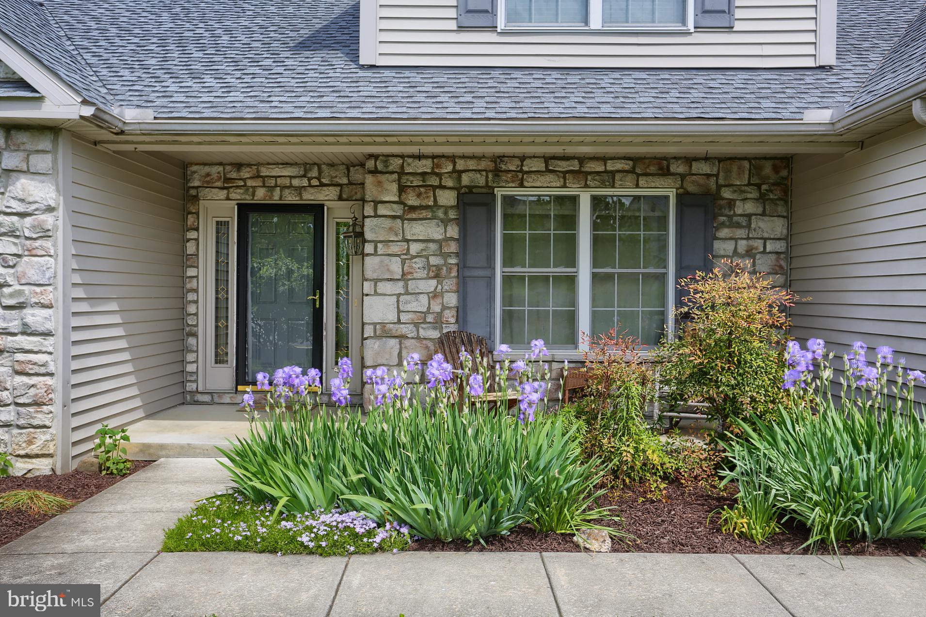 23 Pacific Avenue Reading, PA 19608 - Photo 2 of 38 a front view of a house with plants
