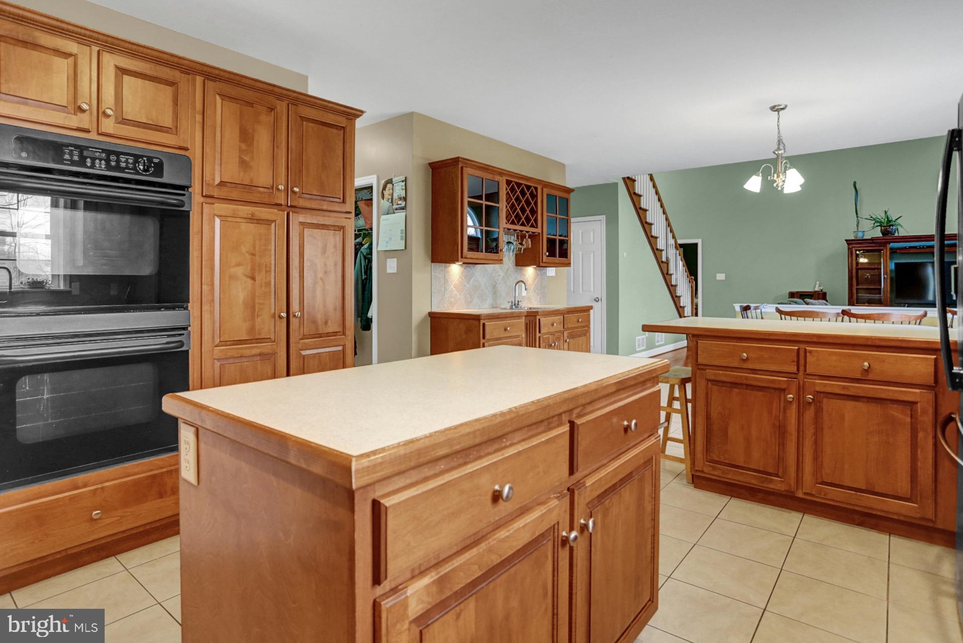 23 Pacific Avenue Reading, PA 19608 - Photo 11 of 38 a kitchen with a sink stove and refrigerator