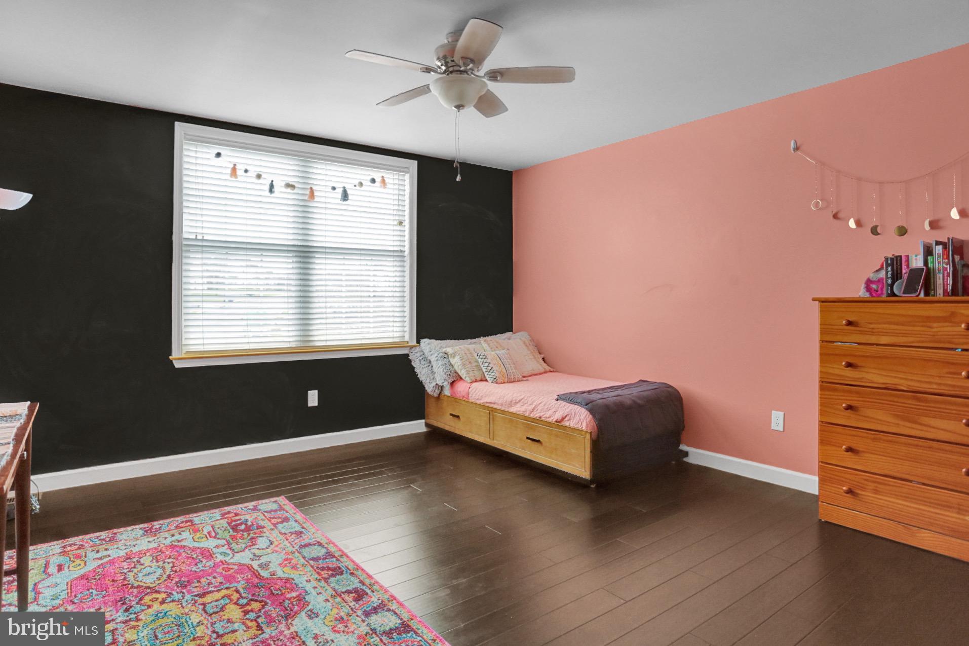 23 Pacific Avenue Reading, PA 19608 - Photo 24 of 38 a bedroom with a bed and a window