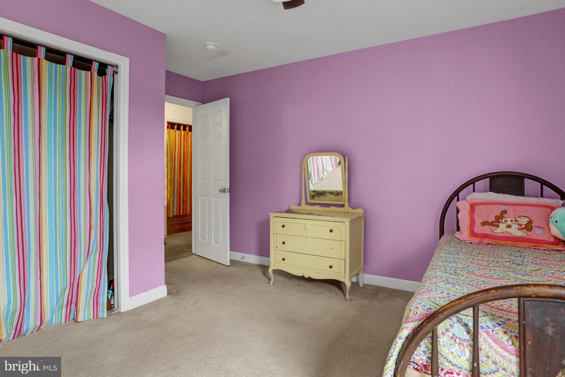 23 Pacific Avenue Reading, PA 19608 - Photo 28 of 38 a view of a bedroom with a bed and a dresser