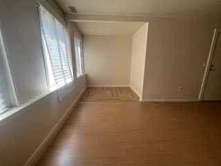 806 South Street Peekskill, NY 10566 - Photo 4 of 9 an empty room with windows