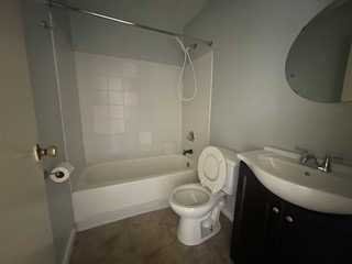 806 South Street Peekskill, NY 10566 - Photo 8 of 9 a bathroom with a sink toilet and shower