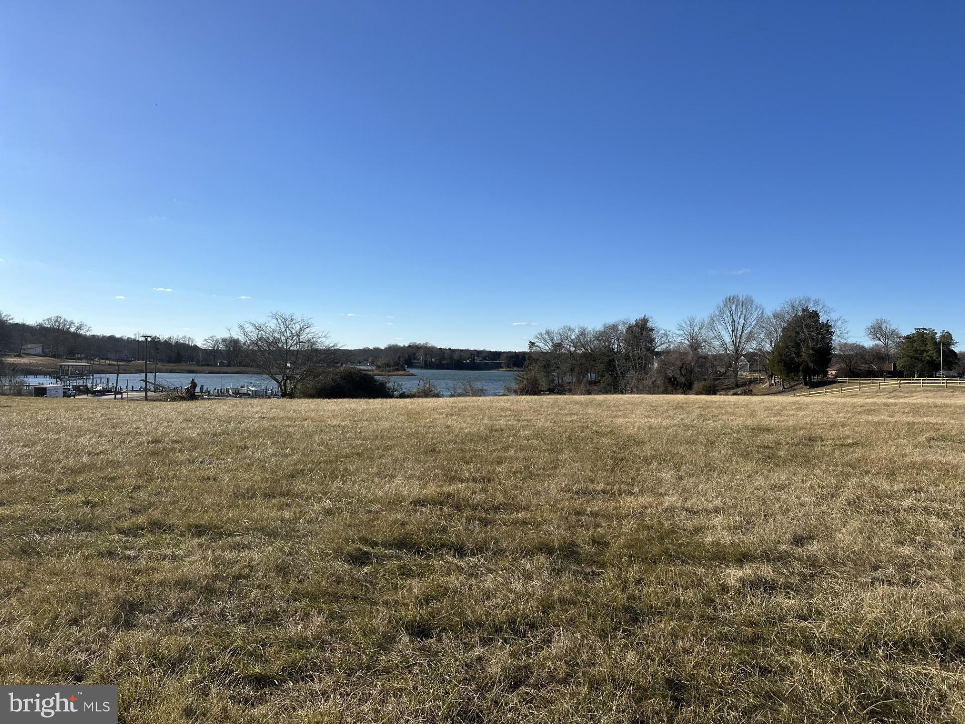 2 Ridge Road Colonial Beach, VA 22443 - Photo 2 of 8 a view of lake with sunset