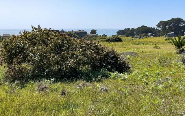 a view of lake with mountain