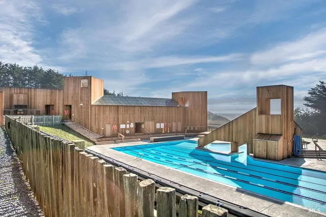 a view of an ocean and mountain