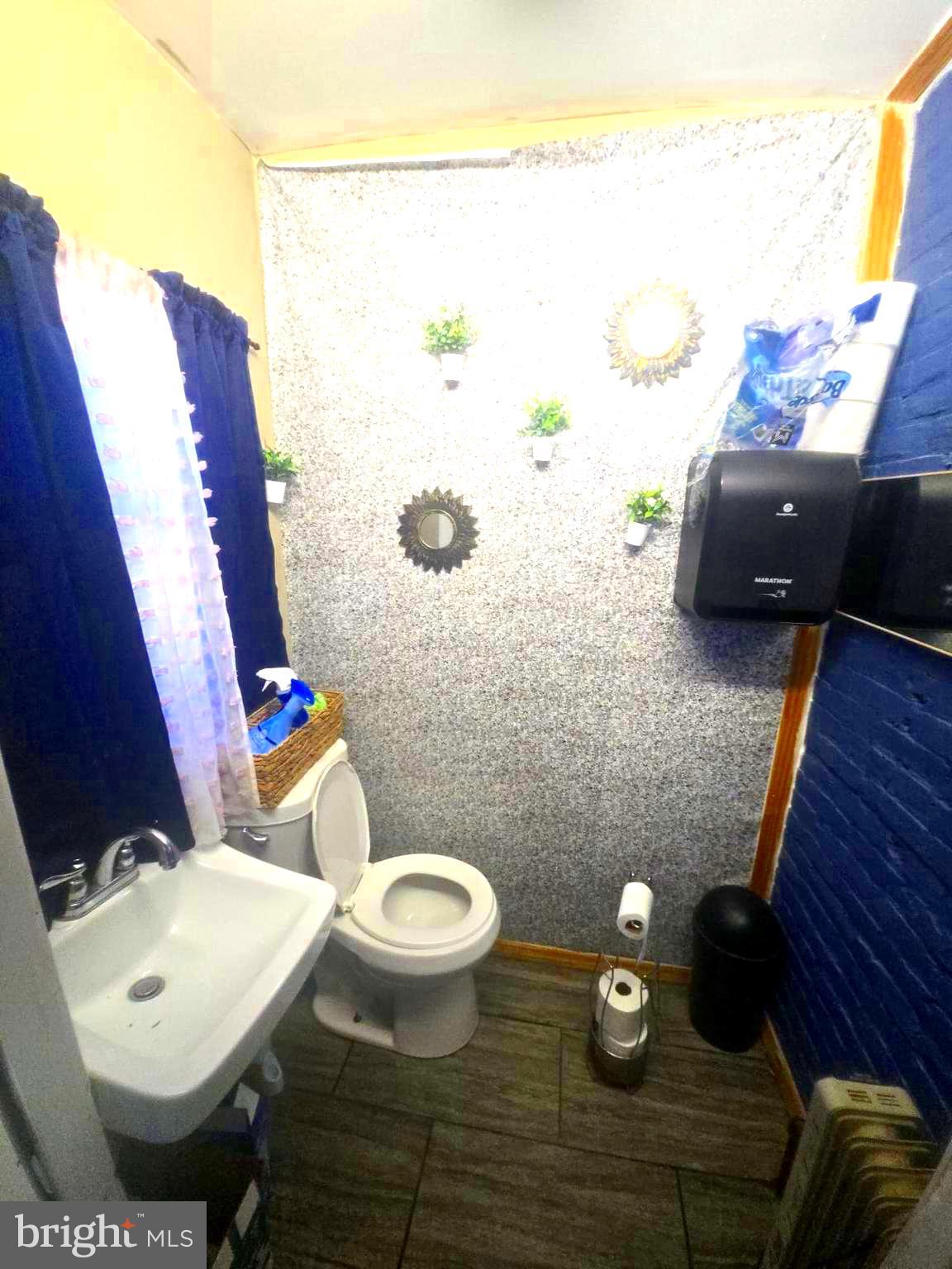 124 Pear Street Reading, PA 19601 - Photo 14 of 19 a bathroom with a toilet and a sink