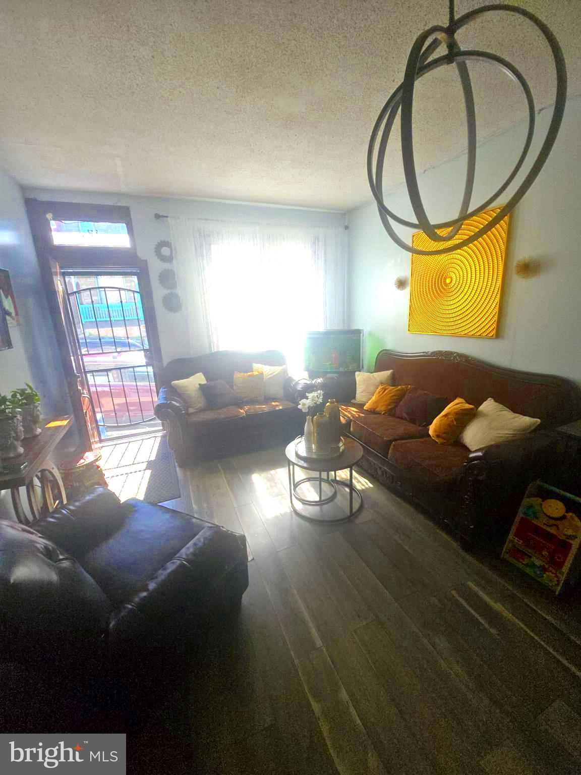 124 Pear Street Reading, PA 19601 - Photo 4 of 19 a living room with furniture and a window