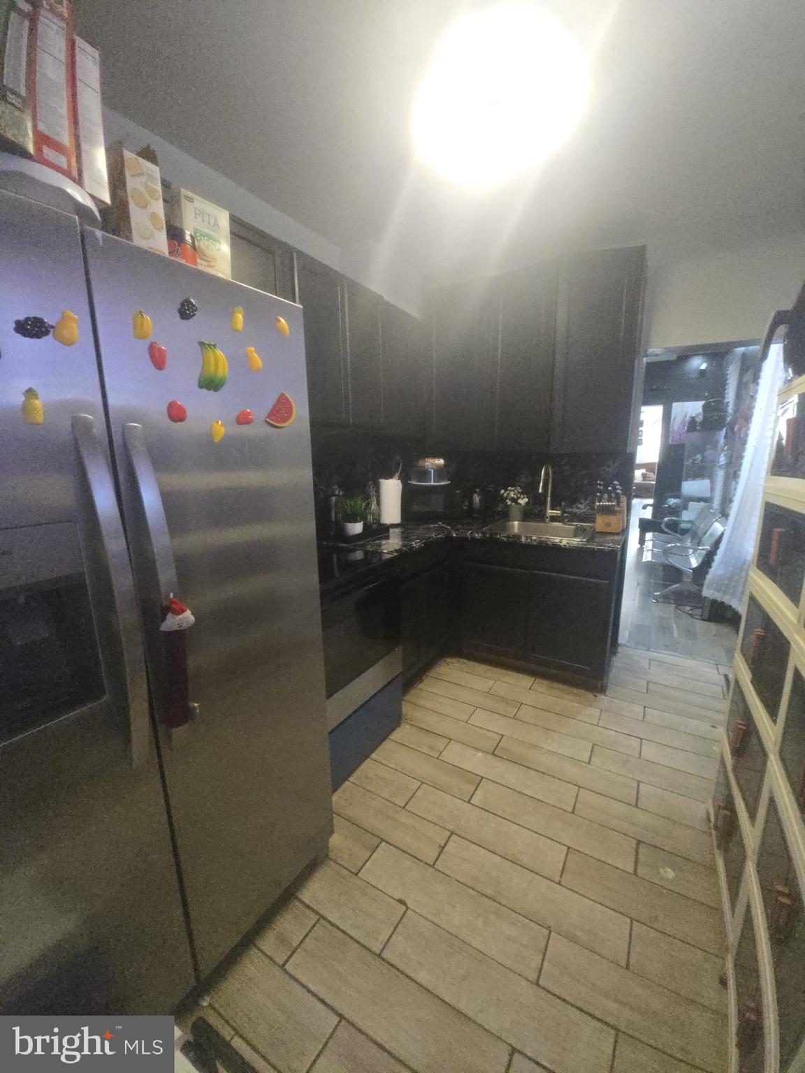 124 Pear Street Reading, PA 19601 - Photo 8 of 19 a kitchen with refrigerator and window