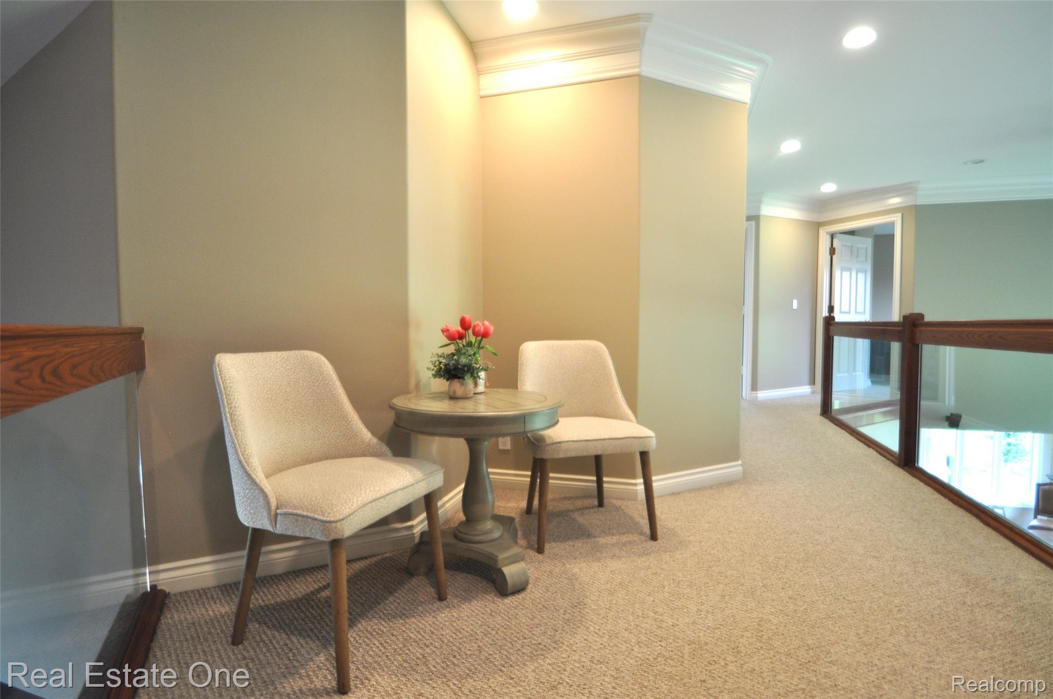 3648 West Tienken Road Rochester, MI 48306 - Photo 27 of 61 Top of the Stairs Sitting Area with Balcony Overlook.