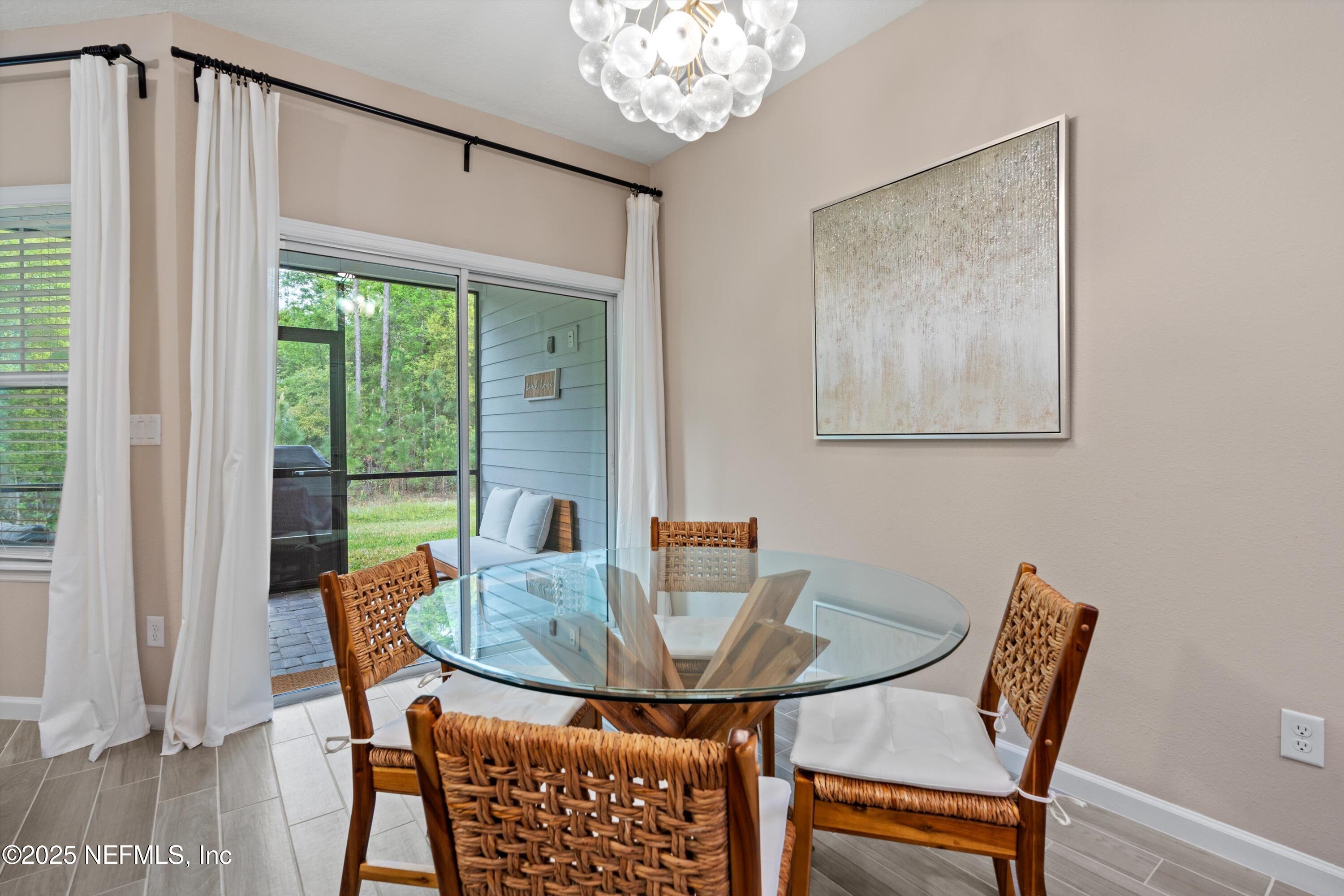 352 Boracay Circle St. Johns, FL 32259 - Photo 13 of 45 a view of a dining room with furniture window and outside view