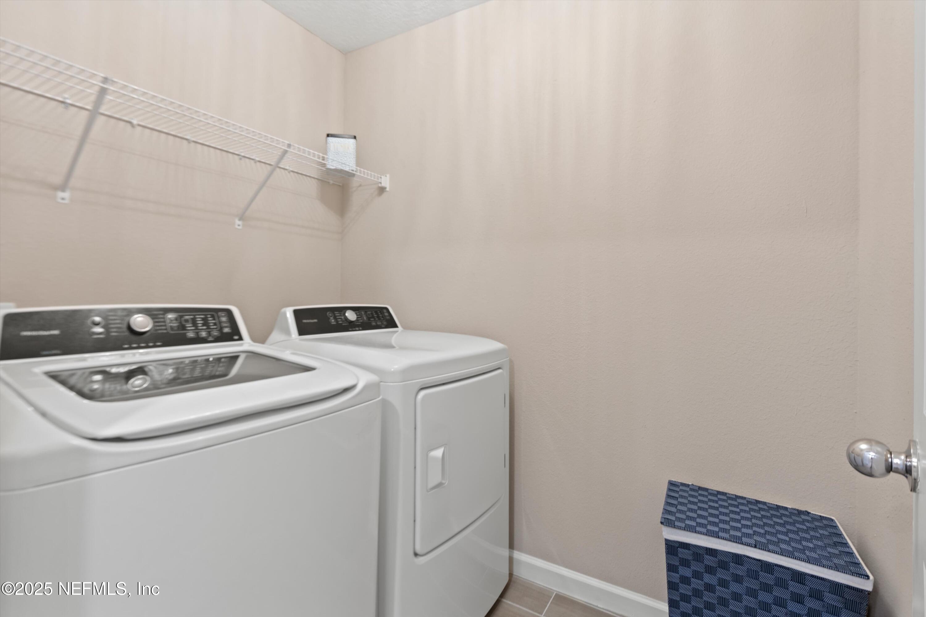 352 Boracay Circle St. Johns, FL 32259 - Photo 26 of 45 a utility room with dryer and washer
