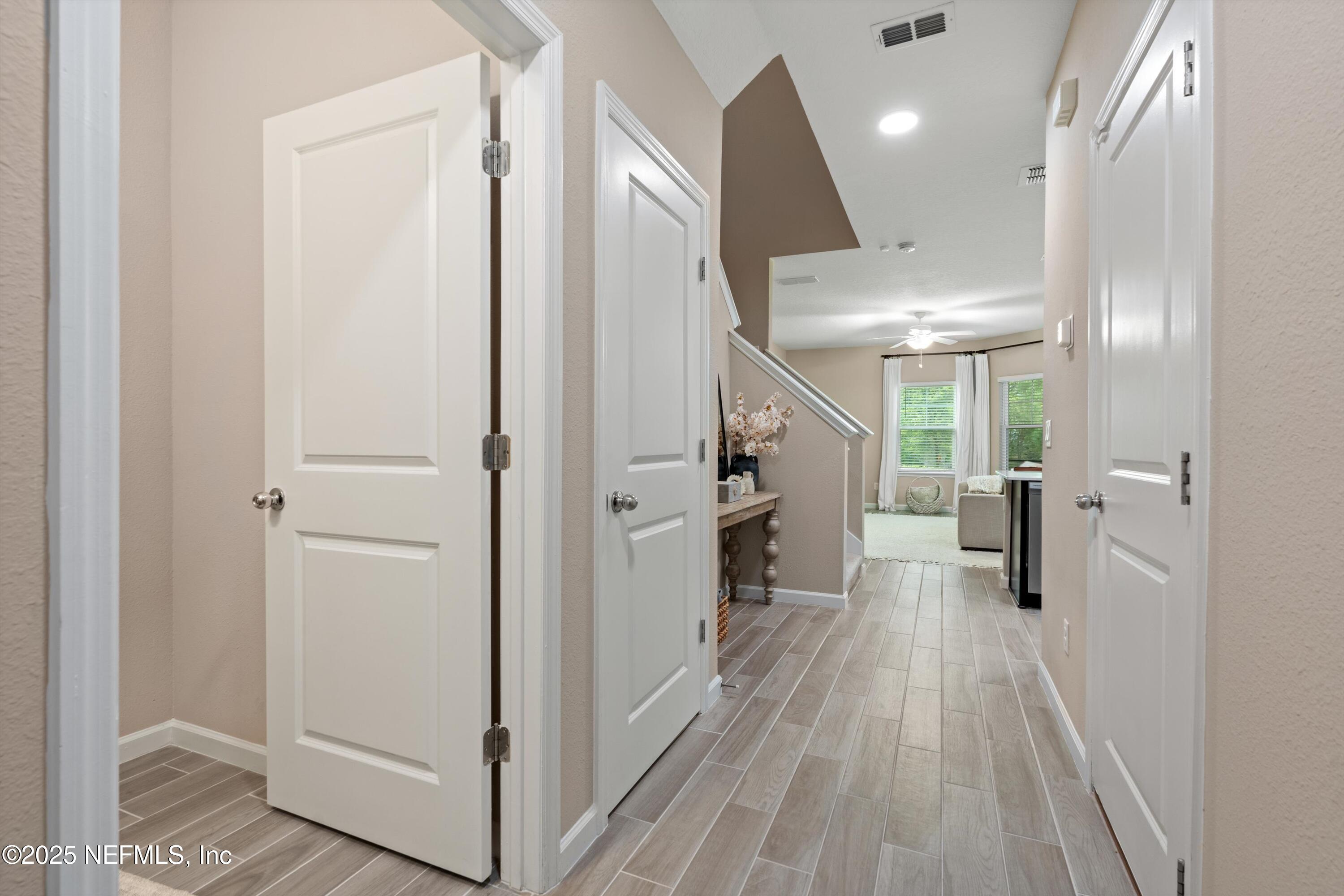 352 Boracay Circle St. Johns, FL 32259 - Photo 5 of 45 a view of a hallway with wooden floor