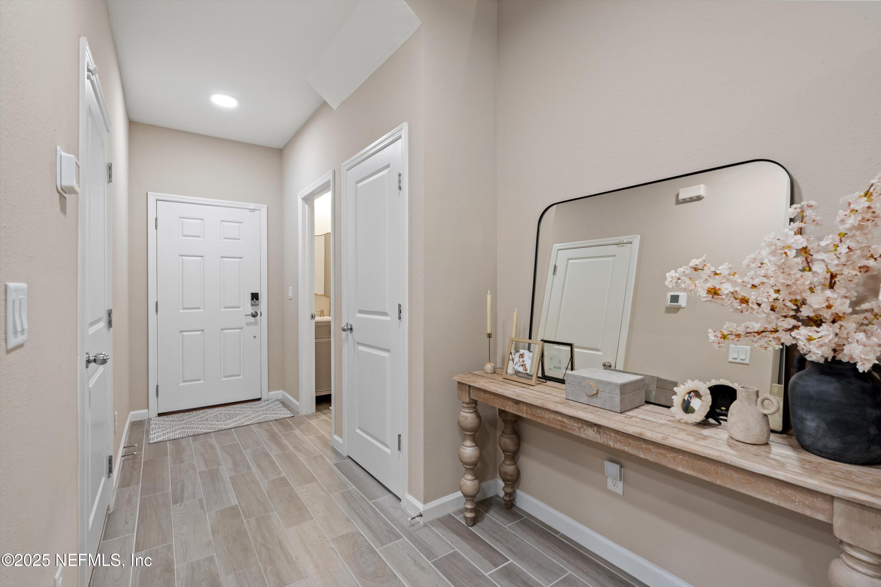 352 Boracay Circle St. Johns, FL 32259 - Photo 6 of 45 a bathroom with a sink and a mirror