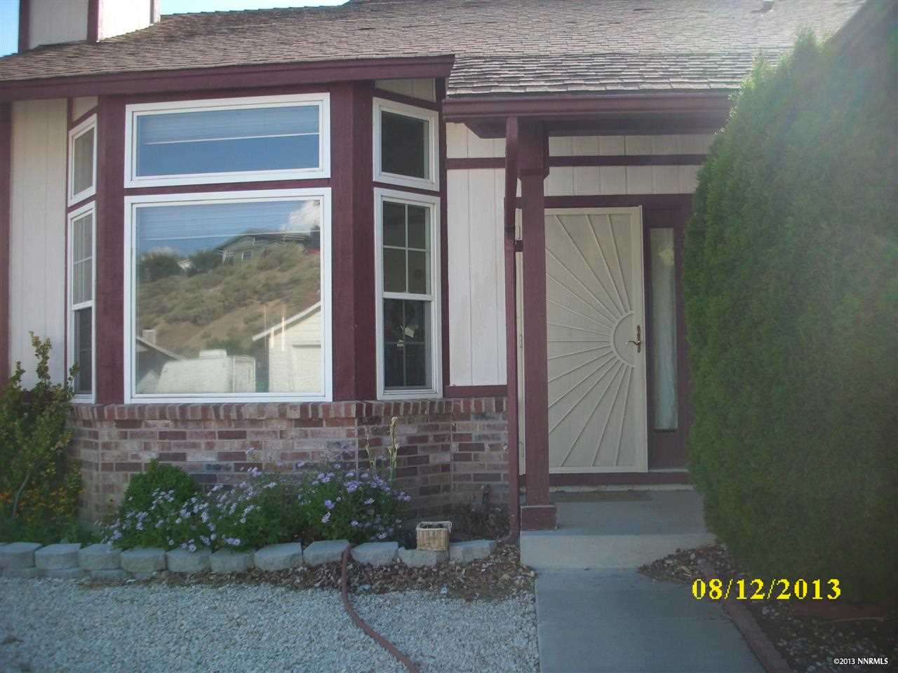 1735 Peavine Road Reno, NV 89503 - Photo 1 of 1 a front view of a house with a yard
