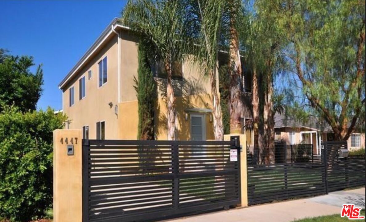 4447 Calhoun Avenue Sherman Oaks, CA 91423 - Photo 1 of 28 a view of a house with a trees