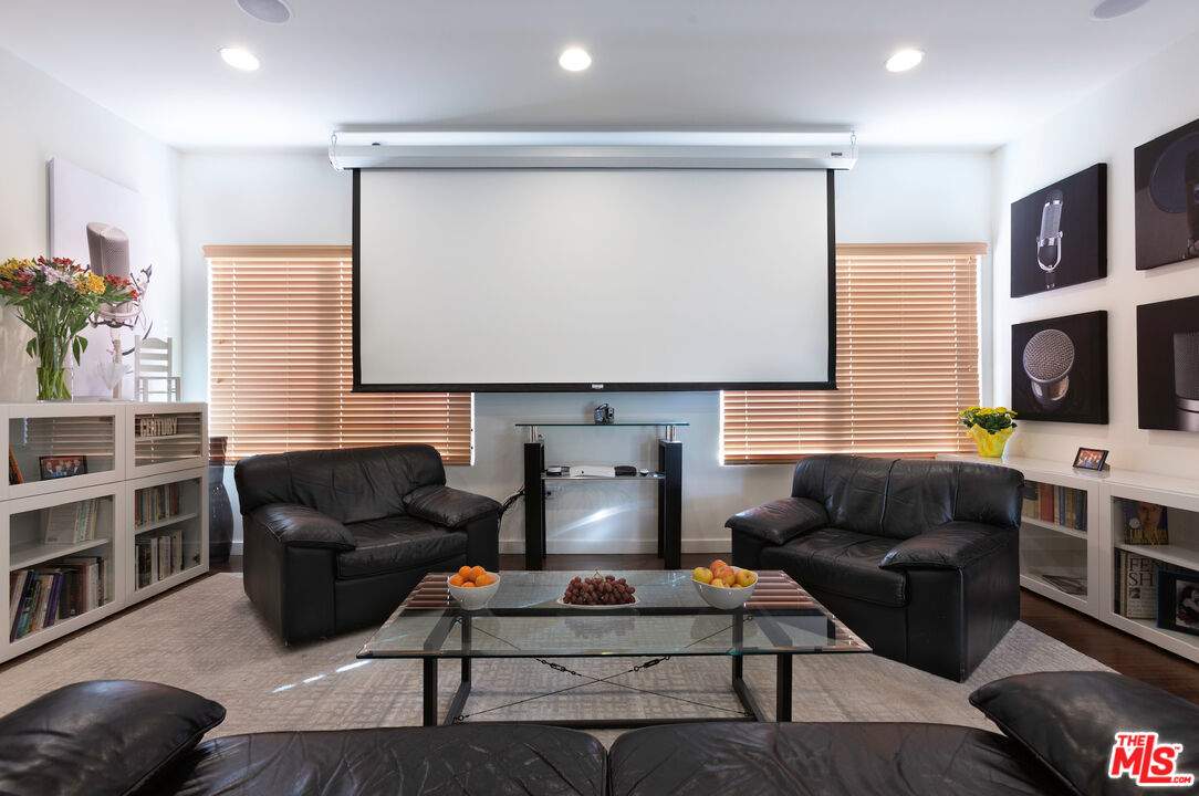 4447 Calhoun Avenue Sherman Oaks, CA 91423 - Photo 6 of 28 a living room with furniture and a flat screen tv