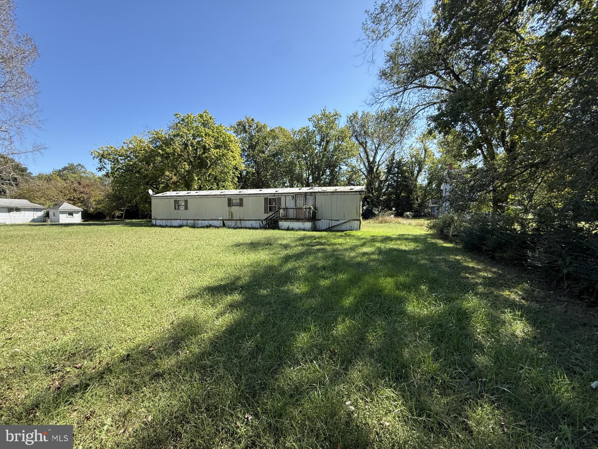 9121 Deal Island Road Deal Island, MD 21821 - Photo 1 of 12 a view of an outdoor space and a yard