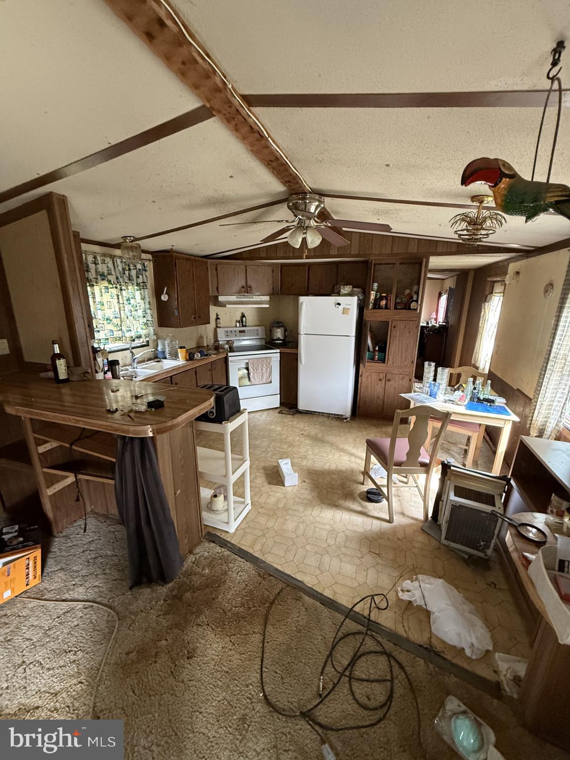 9121 Deal Island Road Deal Island, MD 21821 - Photo 5 of 12 a room with lots of appliances and furniture