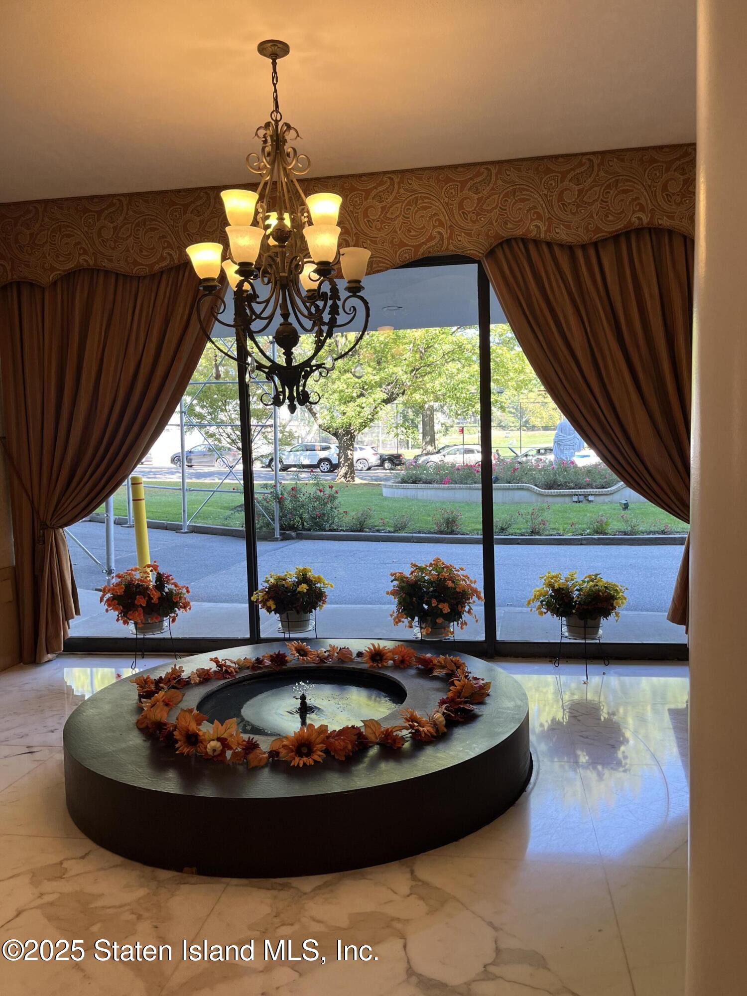 1100 Clove Road, Unit 2L Staten Island, NY 10301 - Photo 4 of 20 a room with a large window