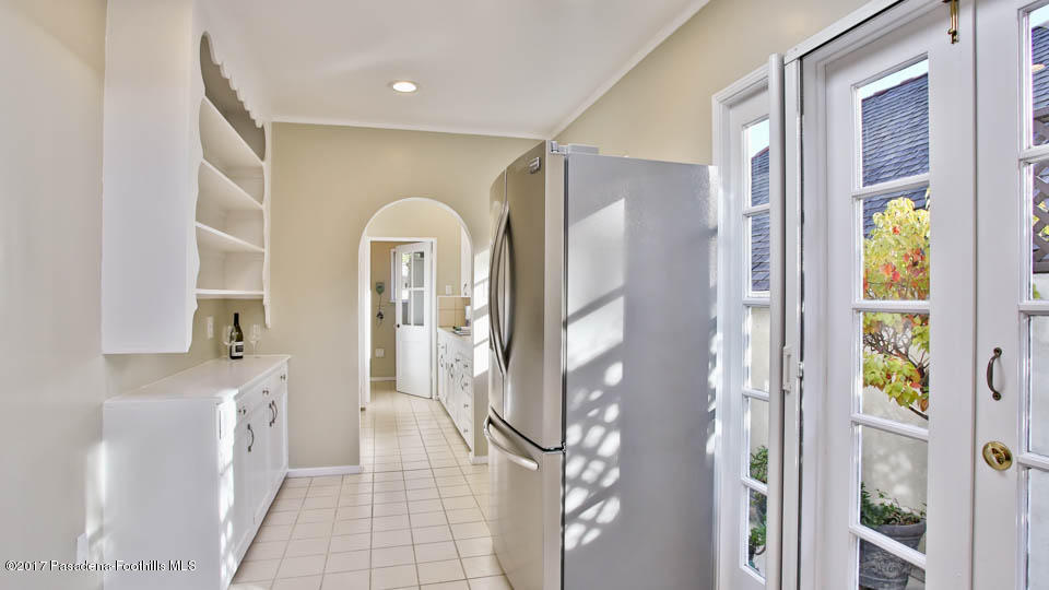 330 Fillmore Street Pasadena, CA 91106 - Photo 11 of 25 a view of a hallway with windows and chandelier