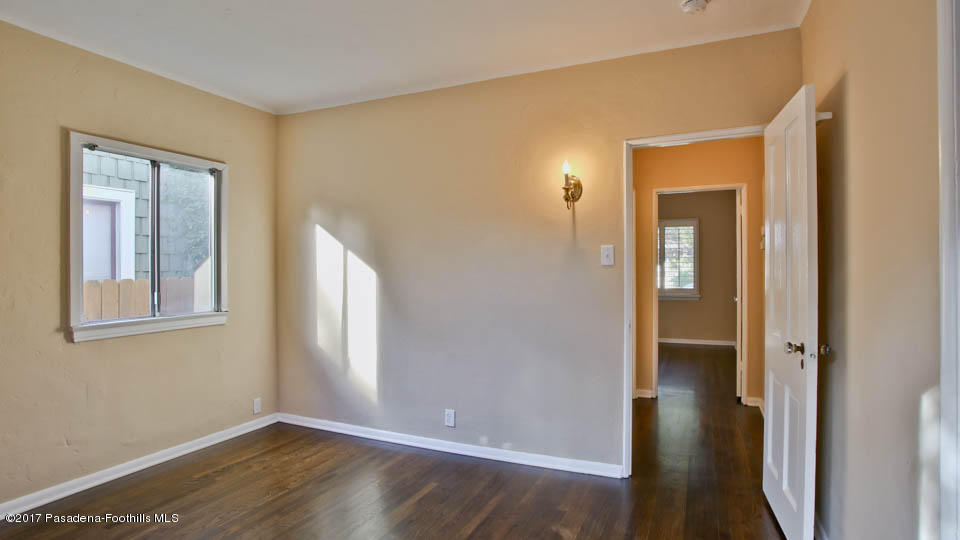 330 Fillmore Street Pasadena, CA 91106 - Photo 20 of 25 a view of an empty room with closet and a window