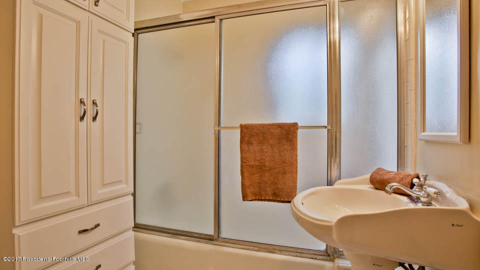 330 Fillmore Street Pasadena, CA 91106 - Photo 23 of 25 a bathroom with a sink and a mirror