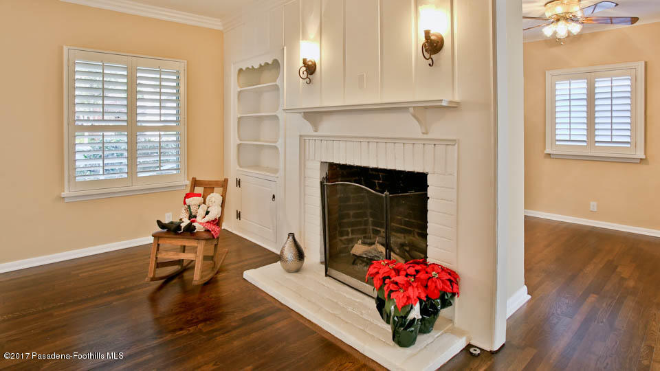 330 Fillmore Street Pasadena, CA 91106 - Photo 4 of 25 a living room with furniture and a fireplace