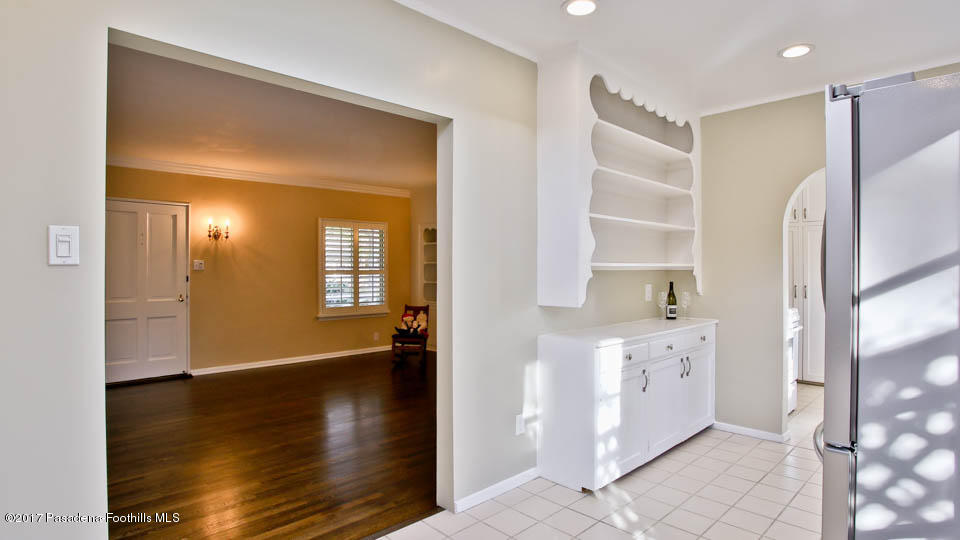 330 Fillmore Street Pasadena, CA 91106 - Photo 10 of 25 a view of an entryway with wooden floor and a cabinet