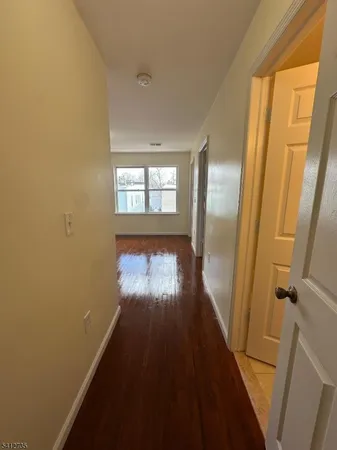 a view of empty room with windows